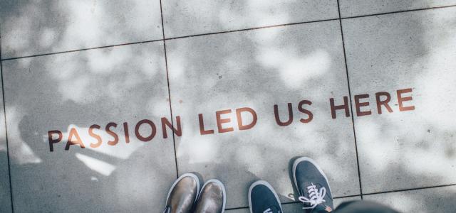 two person standing on gray tile paving by Ian Schneider courtesy of Unsplash.